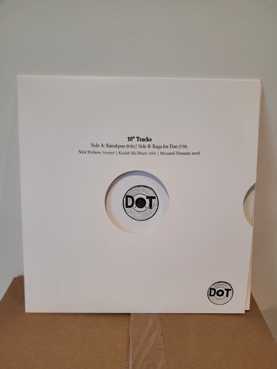 Image of Front Cover of 10" - VG+/VG+ - NICK WALTERS, Ranakpur / Raga for Don (D.O.T.; DOT 1001, UK 2023 Reissue, Stamped Sleeve, Hand Stamped Label. 100-copy repress of limited 10".), , Nick Walters returns to his D.O.T. imprint with a limited edition 10", featuring a selection of two ragas recorded in collaboration with the Pakistani musicians Kashif Ali Dhani (tabla) and Muzamil Hussain (sarod). 'Ranakpur' is a raga using the mode of Raag Charukeshi, a scale referred to in western music theory as the ae