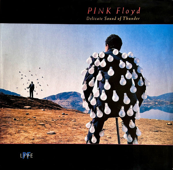 Image of Front Cover of 2xLP - G+/VG - PINK FLOYD, Delicate Sound Of Thunder (EMI; 198-7 91480 1, Europe 1988, Gatefold, 2 Inners, Sides B & D labels embossed Bass clef), Hairlines, edge & ring wear, sticker damage, small tear on opening edge,  - 3646120S