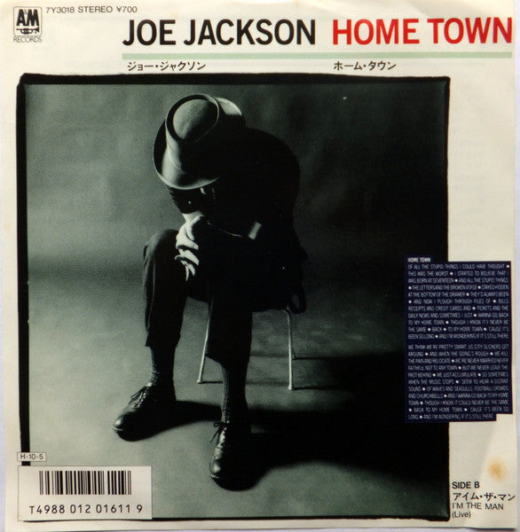 Image of Front Cover of 7" - VG+/VG+ - JOE JACKSON, Home Town (A&M Records; 7Y3018, Japan 1986, Promo, Insert & C), Small smudge/stain on insert (like the discogs picture).,  - 3616171C