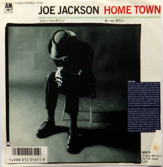 Image of Front Cover of 7" - VG+/VG+ - JOE JACKSON, Home Town (A&M Records; 7Y3018, Japan 1986, Promo, Insert & C), Small smudge/stain on insert (like the discogs picture).,  - 3616171C