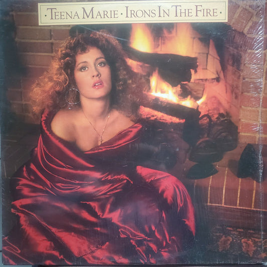 Image of Front Cover of LP - VG/G+ - TEENA MARIE, Irons In The Fire (Gordy; G8-997M1, US 1980, Inner), Pressing flaw on run-in (side two) doesn't affect play. Light marks throughout. Sleeve has wear along opening, ripped shrink, some damage / creasing to inner,  - 3616328C