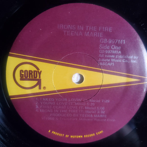 Image of Label Cover of LP - VG/G+ - TEENA MARIE, Irons In The Fire (Gordy; G8-997M1, US 1980, Inner), Pressing flaw on run-in (side two) doesn't affect play. Light marks throughout. Sleeve has wear along opening, ripped shrink, some damage / creasing to inner,  - 3616328C