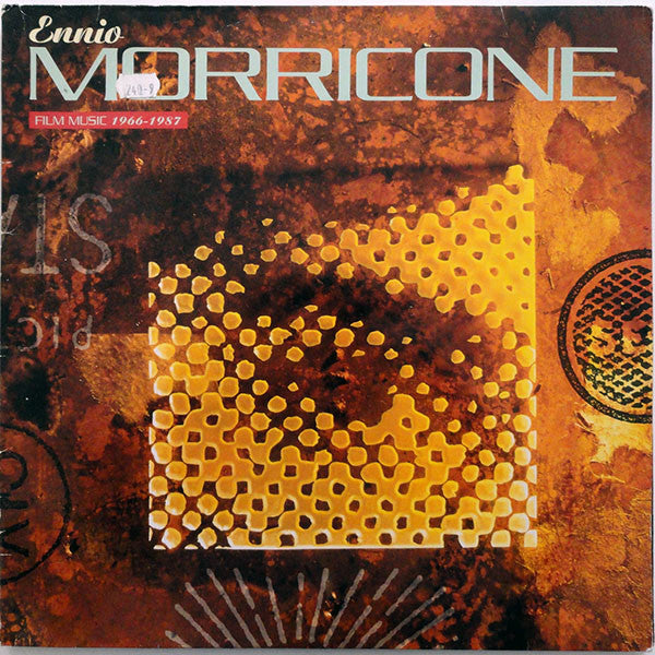 Image of Front Cover of 2xLP - VG/G+ - ENNIO MORRICONE, Film Music 1966-1987 (Virgin; 303 171, Europe 1988, Gatefold), Hairlines all over discs, feelable mark on side 3. Disc 1 is a VG.Spine slightly flattened, light edge wear.,  - 3626440E