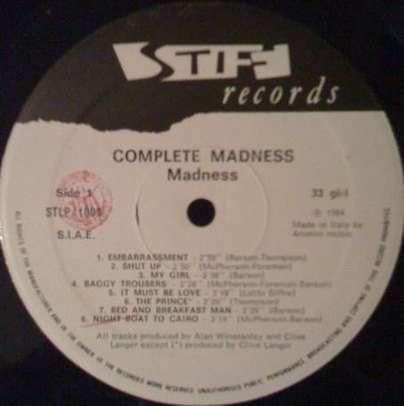 Image of Label Cover of LP - VG/VG - MADNESS, Complete Madness (Stiff Records; STLP / 1004, Italy 1984 Reissue, Gatefold), Clean disc, Slight warp, Light sleeve wear. ,  - 3616303C