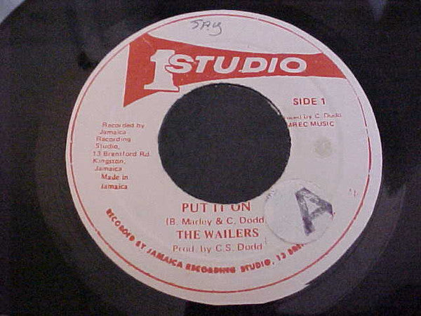 Image of Front Cover of 7" - /VG+ - THE WAILERS / THE SKATALITES, Put It On / Don't Slam The Door (Studio One; , Jamaica 1980s), Light marks, S1 press imperfections. SWOL.,  - 3716131C