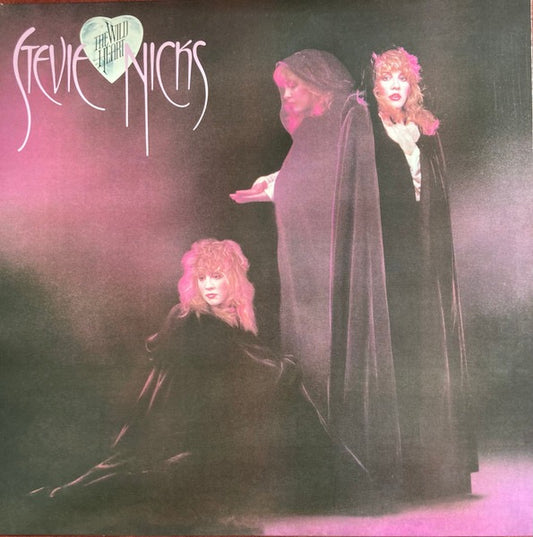 Image of Front Cover of LP - NEW/NEW - STEVIE NICKS, The Wild Heart (Modern Records; 081227943639, UK & Europe 2016 Reissue, Inner, Remastered, Stereo, 180g Vinyl, Fleetwood Mac), , Stevie Nicks returned in 1983 with her follow-up solo album, THE WILD HEART. The album produced hits like  Stand Back,   Nightbird  and  I Will Run To You,  which features Tom Petty and the Heartbreakers. THE WILD HEART: DELUXE EDITION builds on the original album with unreleased versions of  All The Beautiful Worlds  a session 