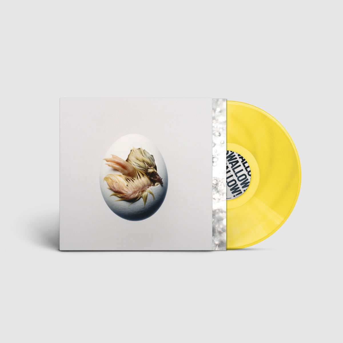 Image of Back Cover of LP - NEW - SHYGIRL, Swallow (Because; BEC5618295, UK 2026, Inner, Limited Edition Transparent Yellow), , Devotional and visceral, patient and euphoric, a poem, a hymnal. Shygirl calls Swallow! a reintroduction. Her 2022 debut Nymph announced an artist fluent in sonic languages: slippery club structures, toothy pop hooks, juicy production—music that invites you to come closer, pay attention, keep up. That magnetism took her from the electronic underground to the foreground of contempor