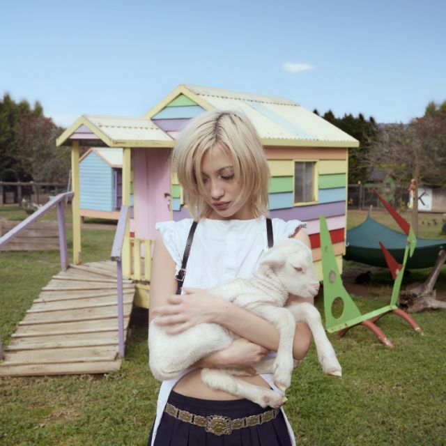 Image of Front Cover of LP - NEW/NEW - DAINE, In Endless Awe & Agony (Pack.; PACK487, UK 2026, White Vinyl), , At 23, daine has spent the last few years drifting between scenes faster than the internet could fully name them: digicore, emo revivalism, hyperpop, bloghouse nostalgia. But In Endless Awe & Agony, her debut album arriving this November, feels less like another pivot than a consolidation — the point where all those fragments collapse into something strangely singular. The Filipino-Australian artis