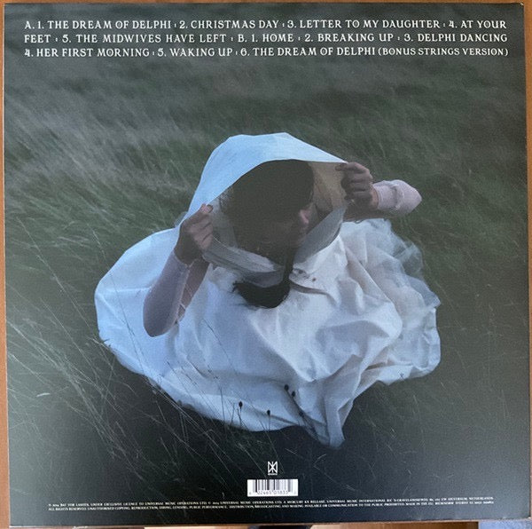Image of Back Cover of LP - NEW/NEW - BAT FOR LASHES, The Dream Of Delphi (Mercury KX; 6501833, Worldwide 2024, Gatefold, Red Vinyl), , Natasha Khan at her most intimate, letting harp, piano, chamber strings and soft-focus electronics carry songs about early motherhood. It is a gentle, slightly strange record with proper weight to it, moving from nursery-room hush to the bright electronic lift of  Home . Quietly ambitious, beautifully arranged and never overdone. - E