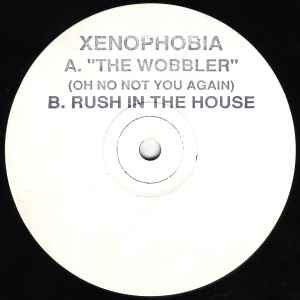 Image of Front Cover of 12" - /G+ - XENOPHOBIA, Rushing The House / The Wobbler (Oh No Not You Again) (Kickin Records; KICK 20, UK 1992, White Label, Stamped), Marks on either side of record. WOL,  - 3846167S
