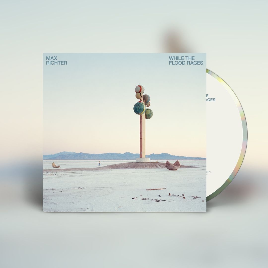 Image of Front Cover of CD - NEW/NEW - MAX RICHTER, While The Flood Rages (Decca; 5744381, UK 2026, CD-A), , Drawn from Max Richter's collaboration with choreographer Wayne McGregor on MaddAddam, inspired by Margaret Atwood's trilogy, While The Flood Rages blends orchestral writing, electronics, processed field recordings, choir and piano. Across 15 tracks in three acts, the album explores ecological collapse, technological acceleration and resilience. - 9414404C