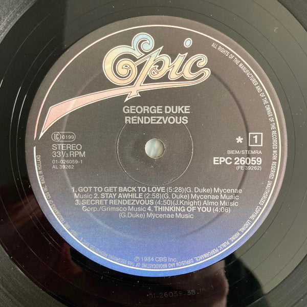 Image of Label Cover of LP - VG/G+ - GEORGE DUKE, Rendezvous (Epic; EPC 26059, Europe 1984, Inner), Lighter marks mainly. Sleeve discoloured and with slight wear; sticker on front; light staining,  - 3816331C