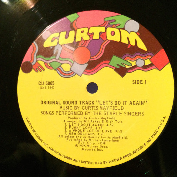 Image of Label Cover of LP - VG/VG - THE STAPLE SINGERS   MUSIC BY CURTIS MAYFIELD, Let's Do It Again (Original Soundtrack) (Curtom; CU 5005, US 1975, Pitman pressing), Light hairlines. Sleeve has cut-out strip, mild ringwear, a little discolouration and a name written on the rear.,  - 3826236E