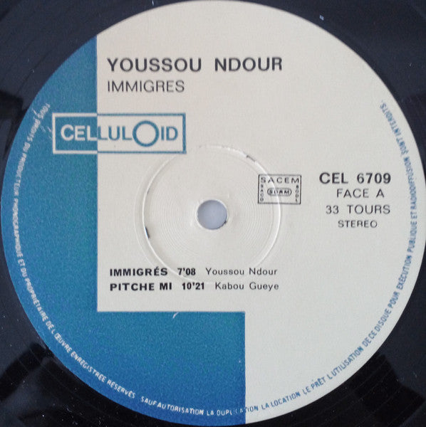 Image of Label Cover of LP - G+/G+ - YOUSSOU NDOUR & LE SUPER ETOILE DE DAKAR, Immigr s / Bitim Rew (Celluloid; CEL 6709, France 1985), Sleeve worn and damaged at spine and edges,  - 3816533C