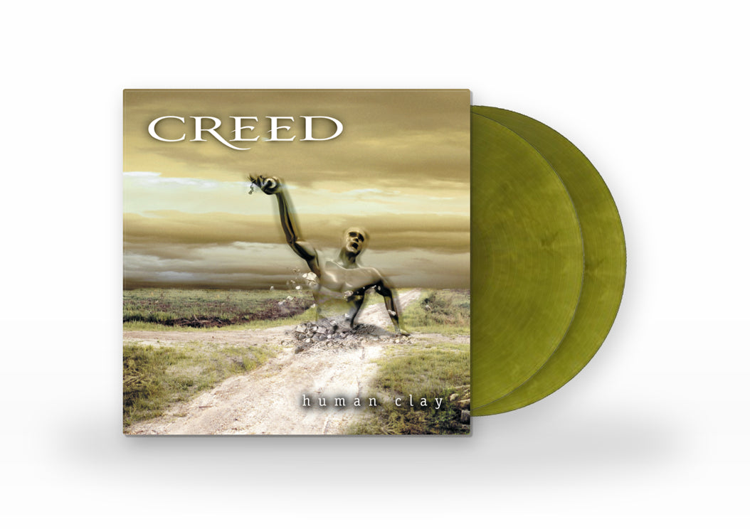 Image of Front Cover of 2xLP - NEW/NEW - CREED, Human Clay (Concord; 7280516, UK 2026 Reissue, Gatefold, "Up In Smoke" Coloured vinyl), , The two-LP set is housed in a gatefold jacket and pressed on "Up In Smoke" coloured vinyl. Human Clay, which has sold over 20 million units worldwide, includes hits “Higher,” “What If,” “Are You Ready,” and the GRAMMYÒ Award-winning single, “With Arms Wide Open.” | Barcode in source: 8.88073E+11 (incomplete scientific notation) - 9415887C