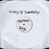 Image of Front Cover of 12" - /G - HIXXY & SHARKEY, Toy Town (Vocal Mix) (Not On Label; TOWN 001, UK 2001, White Label, Single Sided), Extensively scuffed and marked all over., Limited to 500 copies.Also known as "Toy Town (Vinyl Groover '97 Mix)" & "Toy Town (Remix)".This remained unreleased until 2001, when IMO Records ordered a limited pressing and sold it exclusively on their online record shop. - 3816611C