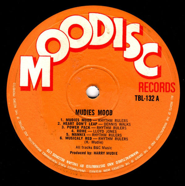 Image of Back Cover of LP - /VG - RHYTHM RULERS*, Mudies Mood (Moodisc; TBL 132, UK 1970), 12 inch sleeve only, no original cover. SWOL. A few hairline marks, does not affect play. , A1	Rhythm Rulers* 	Mudies MoodA2	Dennis Walks 	Heart Don't LeapA3	Rhythm Rulers* 	Power PackA4	Lloyd Jones (2) 	RomeA5	Rhythm Rulers* 	MannixA6	Rhythm Rulers* 	Musically RedB1	Ebony Sisters* 	Let Me Tell You BoyB2	Don Cornal And The Eternals* 	Lets Start AgainB3	Rhythm Rulers* 	Walking The DeadB4	Dennis Walks 	The Dri