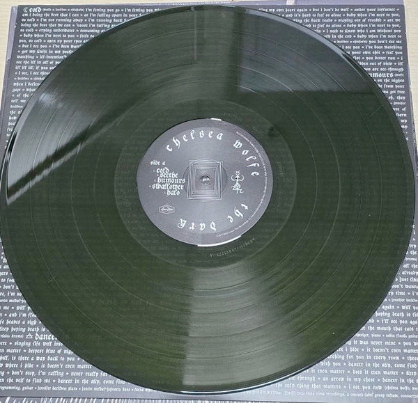 Image of Back Cover of LP - NEW/NEW - CHELSEA WOLFE, The Dark (Loma Vista; 00888072812796, Europe 2026, Inner, Translucent Dark Grass Green Vinyl, Indies Exclusive), , Chelsea Wolfe enters a new era with The Dark, an album shaped by newfound sobriety and deep self-reckoning. Lead single 'Cold' centres on the isolation of a toxic relationship and the difficult process of finally letting go. - 3916216C