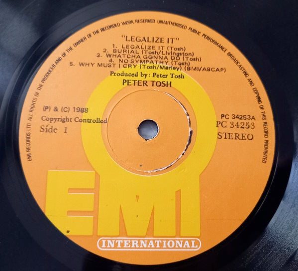 Image of Label Cover of LP - VG/G - PETER TOSH, Legalize It (EMI International; PC 34253, Nigeria 1988 Reissue), Lots of light marks but plays pretty well! Edge an corner wear to sleeve.,  - 3916276C