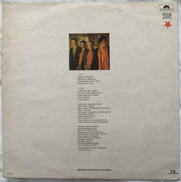 Image of Back Cover of LP - VG/VG+ - LEVEL 42, World Machine (Trutone Music; POLH 25, Zimbabwe 1986), Writing on front cover. Zimbabwean press.,  - 3926183E