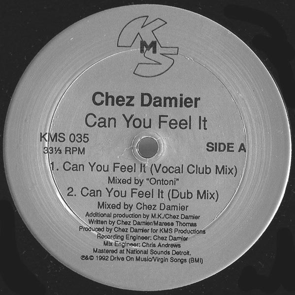 Image of Front Cover of 12" - VG/G+ - CHEZ DAMIER, Can You Feel It (KMS; KMS 035, US 1990s Reissue, Die Cut Company Sleeve), Light marks and hairlines, A side label off-center. Spine damage to sleeve.,  - 3916519C