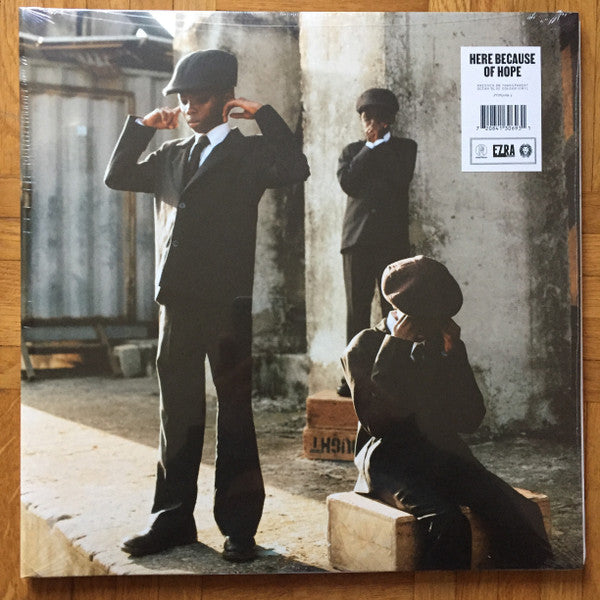 Image of Front Cover of 2xLP - VG+/VG+ - EZRA COLLECTIVE, Here Because of Hope (Partisan Records; PTSN3069-3, Worldwide 2026, Gatefold, 2 Inners, Transparent Ocean Blue Vinyl), seam splits on both Inners,  - 4046027S