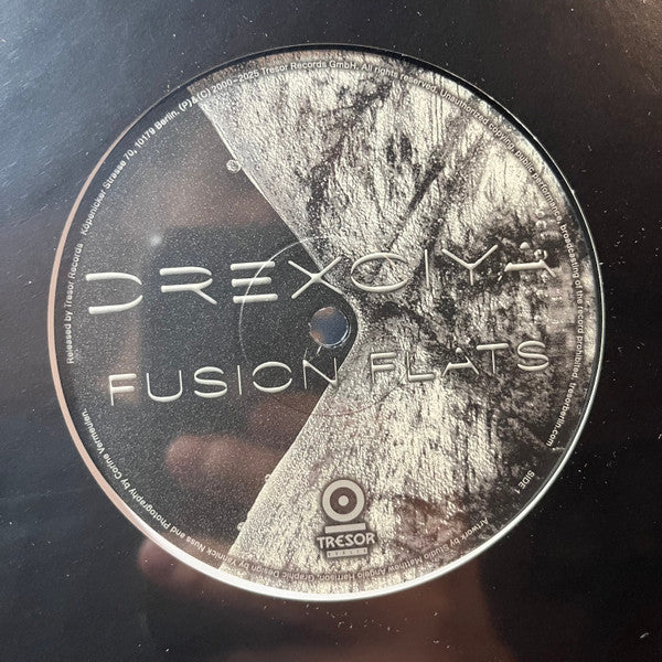 Image of Front Cover of 12" - /VG+ - DREXCIYA, Fusion Flats (Tresor; Tresor.130, Germany 2025 Reissue, Plain Sleeve), , A1 Fusion Flats (Octave One Remix)A2 Fusion Flats (Original)B1 Fusion Flats (Kaotic Spacial Rhythms Remix)B2 Fusion Flats (043 Chaos Remix) - 4026145E