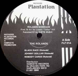 Image of Label Cover of LP - /G+ - THE ROLANDS, Johnny Dollar (Rockers Plantation; PLP 01, UK 1982), Marks on disc but plays well.General wear to sleeve with ringwear.,  - 4046129S