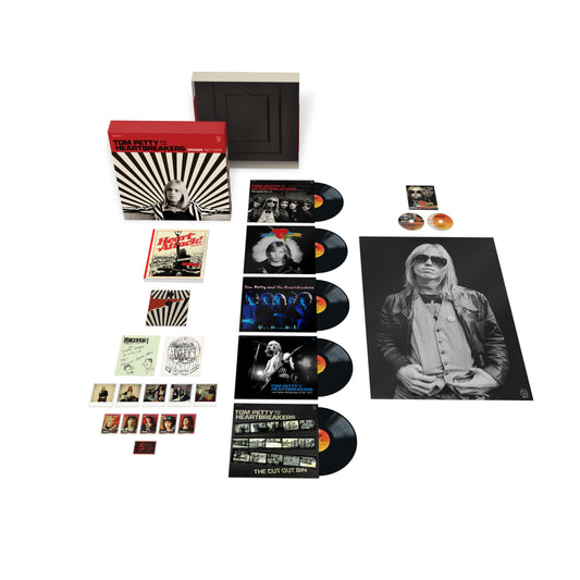 Image of Front Cover of 7xLP + DVD + Blu-ray - NEW/NEW - TOM PETTY AND THE HEARTBREAKERS, Origins 1971-1978 (UMR; 7649735, UK 2026, 88-Page Fanzine, 24 x 36" Poster, Archival Postcards, Collector Card Stickers , 5LP 180g Vinyl, DVD, Blu-ray Audio with Logo Patch), , Origins 1971-1978 chronicles Tom Petty and the Heartbreakers' first eight years as recording artists across 51 tracks, including 27 unreleased, live, extended and previously unheard recordings. All tracks are newly mixed from the original multit