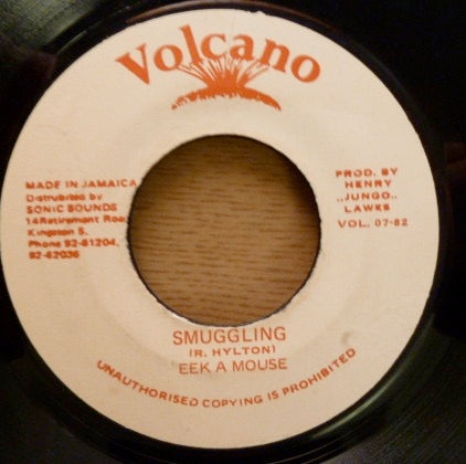 Image of Front Cover of 7" - /G+ - EEK A MOUSE, Smuggling (Volcano; VOL. 07-82, Jamaica 1982), Marks and scuffs, plays through fine. WOL.,  - 4016422C