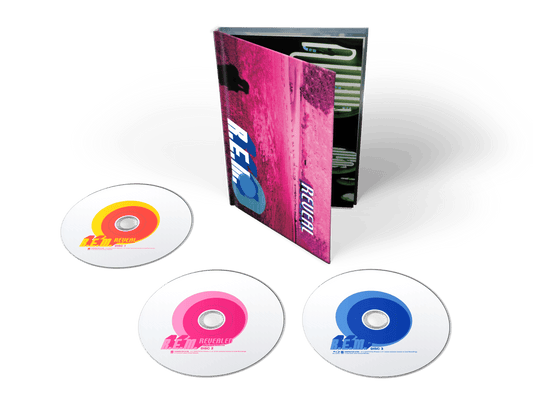 Image of Front Cover of 3xCD - NEW/NEW - R.E.M., Reveal (25th Anniversary) (Concord; 7281578, UK 2026 Reissue), , Celebrate 25 years of R.E.M.’s Reveal with this deluxe 3-disc edition. The original album, including ‘Imitation Of Life’ and ‘All The Way To Reno (You’re Gonna Be A Star)’, is paired with The Black Sessions Revealed, recorded live for Radio France in 2001. A Blu-ray rounds out the set with hi-res and 5.1 surround audio, music videos and the original Reveal EPK. - 9417389C