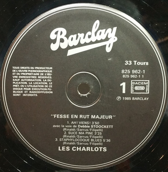 Image of Label Cover of LP - VG/VG - LES CHARLOTS, Fesse En Rut Majeur (Barclay; 825 962-1, France 1985, Die Cut Inner), Mottling, paper scuffs and hairlines all over disc. Strong VG sleeve. Still in stickered shrinkwrap, inner intact, light stain to left corner, wear to opening edge.,  - 4026353E