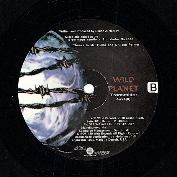 Image of Back Cover of 2xLP - /VG - WILD PLANET, Transmitter (430 West; 4w-400, US 1999, Plain Sleeve), Faint hairlines only., A		Frozen SignalB1		HemisphereB2		OctaveC		FuelD1		TransmitterD2		Infinite - 4116055C