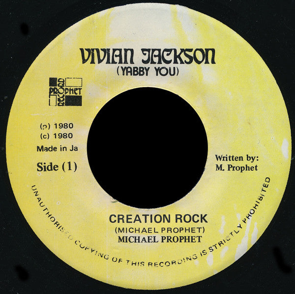 Image of Front Cover of 7" - /VG - MICHAEL PROPHET, Creation Rock / Version (Vivian Jackson (Yabby You); , Jamaica 1980, Plain Sleeve, Yellow label variant), Multiple light hairlines. WOL.,  - 4126235E