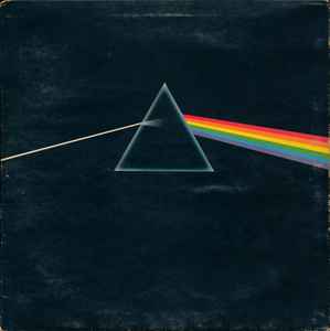 Image of Front Cover of LP - G/G+ - PINK FLOYD, The Dark Side Of The Moon (Harvest Black/Solid Blue; SHVL 804, UK 1973, Gatefold, Black Inner, 2 Posters, 1 Sticker, A2/ B2 Matrix, Grammophone Labels at 10 o'clock), Record Is Close To VG, Surface Noise And Pops. Sleeve Has Split Seems, Edge Wear And Ring Wear., Very first pressing with SOLID BLUE TRIANGLE LABELS. Grammophone Company Limited at 10 o'clock. EMI Boxed logo. Standard Black Sleeve. Gatefold with one side opening. Comes with NO Posters OR Stickers