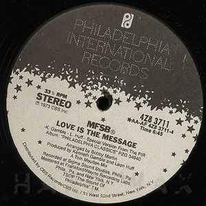 Image of Front Cover of 12" - VG+/VG+ - MFSB, Love Is The Message / TSOP (The Sound Of Philadelphia) (Philadelphia International Records; 4Z8 3711,  , Company Sleeve), Light ringwear & small tear on sleeve.,  - 4126461E