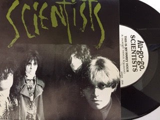 Image of Front Cover of 7" - VG/VG+ - SCIENTISTS, This Is My Happy Hour / Swampland (Au Go Go ; ANDA 25, Australia 1982 Reissue, Picture Sleeve, Second Pressing With Green Writing), Strong VG+, Sticker Damage To Sleeve, Corner Bump,  - 4226124E