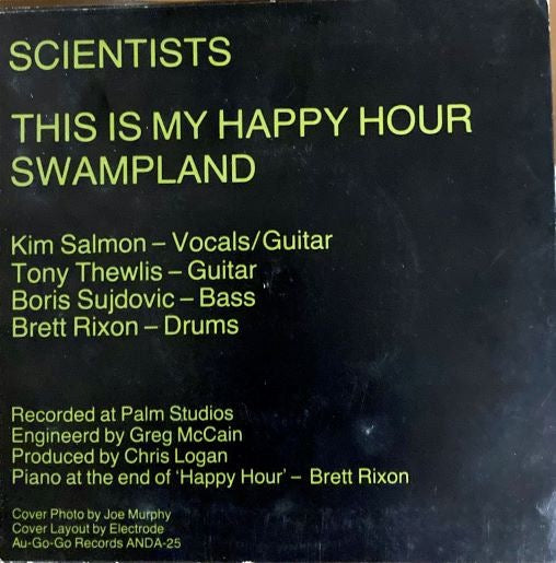 Image of Back Cover of 7" - VG/VG+ - SCIENTISTS, This Is My Happy Hour / Swampland (Au Go Go ; ANDA 25, Australia 1982 Reissue, Picture Sleeve, Second Pressing With Green Writing), Strong VG+, Sticker Damage To Sleeve, Corner Bump,  - 4226124E