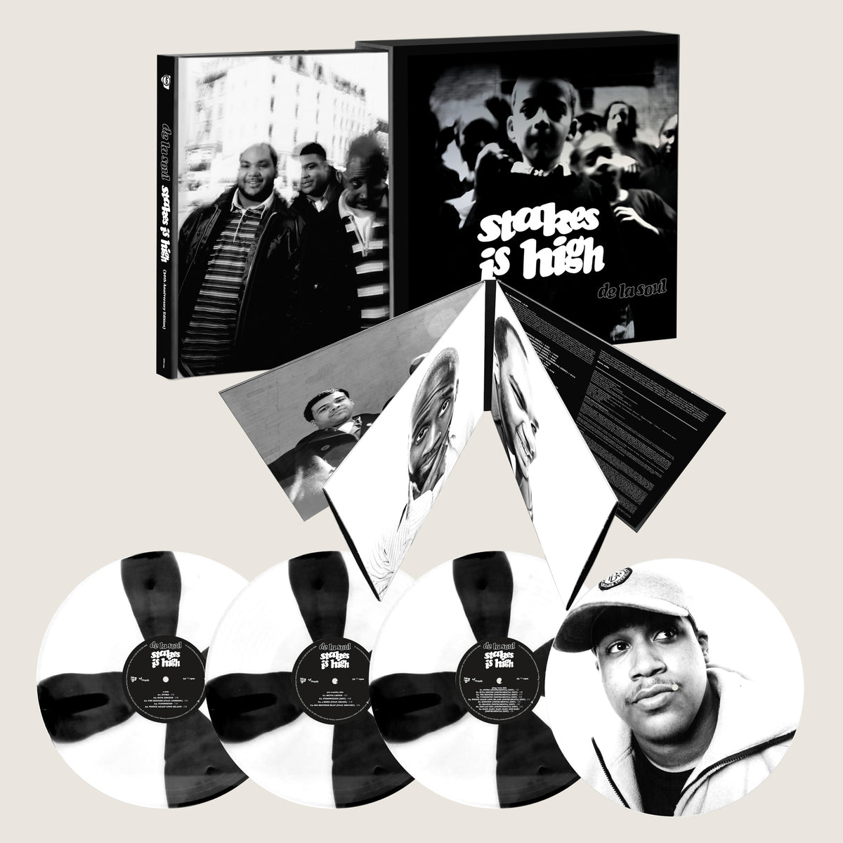 Image of Front Cover of 4xLP - NEW/NEW - DE LA SOUL, Stakes Is High (30th Anniversary) (Chrysalis Records; RMM10351, UK 2026 Reissue, Black & White Spoke-Pattern Vinyl ), , 30th anniversary remaster of De La Soul's 1996 album, featuring the original record, instrumentals, remixes and rarities including J Dilla remixes of 'Stakes Is High'. - 9419174C