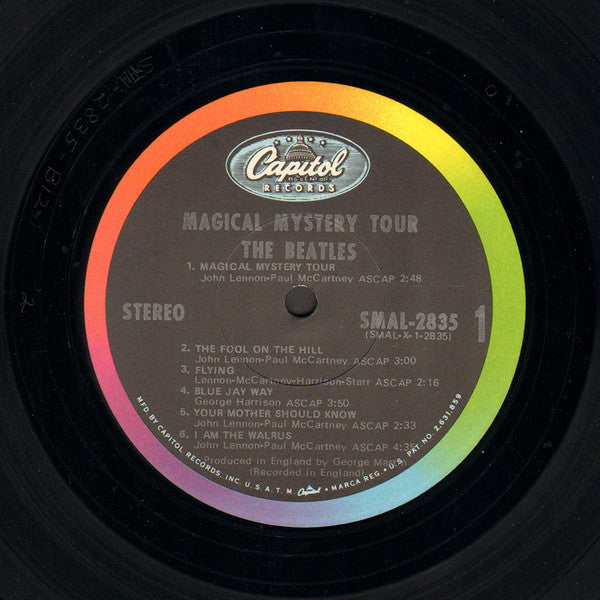 Image of Label Cover of LP - G+/G+ - THE BEATLES, Magical Mystery Tour (Capitol Records; SMAL 2835, US 1968, Gatefold, Detached Booklet, Stereo), Edge wear and sticker residue on cover. Hairlines on disc.,  - 4246340S