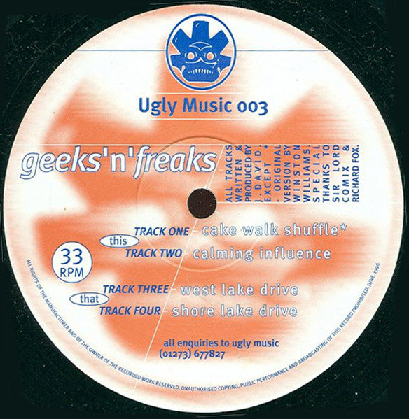 Image of Front Cover of 12" EP - /G - JUSTIN DAVID, Geeks'N'Freaks EP (Ugly Music; UGM 003, UK 1995), Record marked and scuffed, some deeper than others. Writing on labels, A1		Cake Walk ShuffleA2		Calming InfluenceB1		West Lake DriveB2		Shore Lake Drive - 4216551C