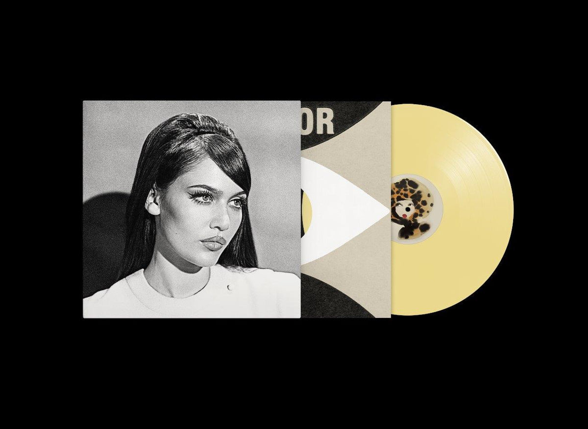 Image of Front Cover of LP - NEW/NEW - SIENNA SPIRO, Visitor (Deluxe Unplugged) (Capitol; 6166172, UK 2026, Deluxe Edition Butter Yellow Vinyl with New Artwork), , Deluxe edition of Sienna Spiro’s debut album Visitor, pairing deeply personal, soulful songs about pain and uncertainty with additional tracks, including unplugged versions of “Die On This Hill”, “Pure” and “Mono No Aware”. - 9419504C
