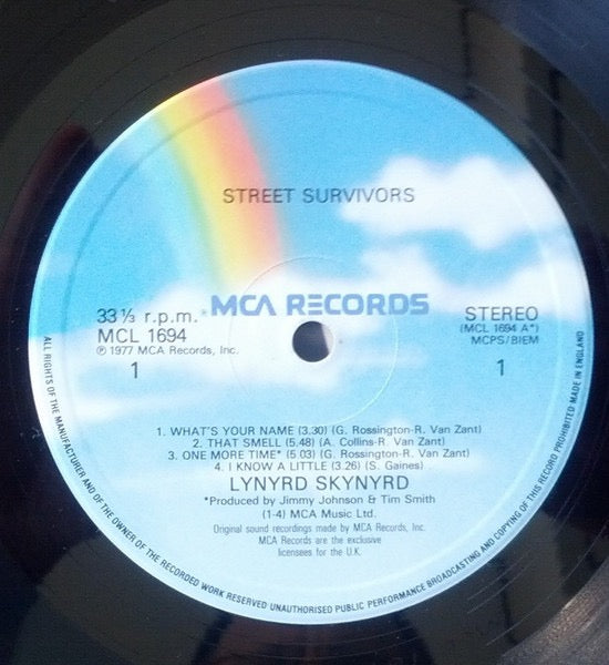 Image of Label Cover of LP - VG/VG - LYNYRD SKYNYRD, Street Survivors (MCA Records Rainbow Labels  With Raised Rim; MCL 1694, UK 1982 Reissue), Strong VG Disc, Very light hairlines, Sleeve has wear to all edges,  - 4316389C