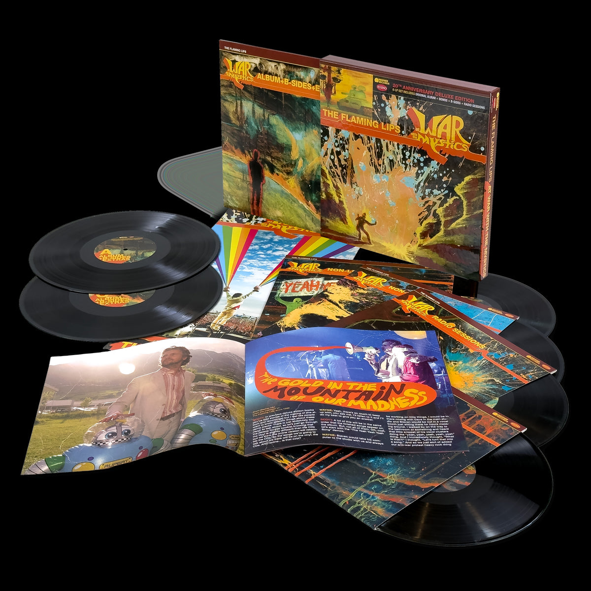 Image of Front Cover of 6xLP - NEW - THE FLAMING LIPS, At War With The Mystics (Rhino Warner; , UK 2026 Reissue, Box Set, 6LP Anniversary Boxset), , 20th anniversary expanded edition of the 2006 Flaming Lips album, featuring the first remaster of the original album, previously unreleased demos and studio recordings, and additional non-album material. The 6LP set presents the original album remastered for the very first time across three sides of vinyl, 19x previously unreleased Demos, 12x previously unrelea