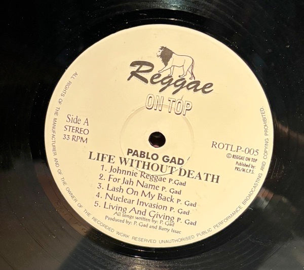 Image of Label Cover of LP - /VG - PABLO GAD, Life Without Death (Reggae On Top; ROTLP-005, UK 1993), White label test pressing with track listing hand written on both sides in plan 12'' sleeve. Light hairline marks that don't affect play. , A1		Johnnie ReggaeA2		For Jah NameA3		Lash On My BackA4		Nuclear InvasionA5		Living And GivingB1		Coke AddictB2		Life Without DeathB3		CrazyB4		Jah LoveB5		The Beginning - 4226062E