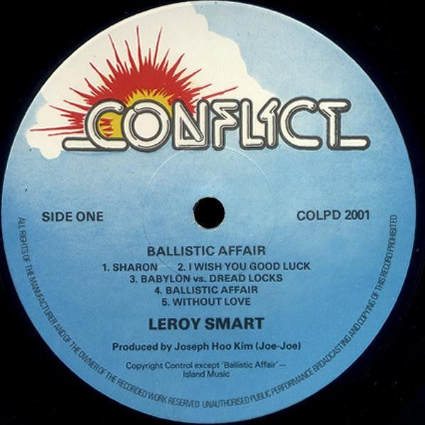Image of Label Cover of 2xLP - /VG - LEROY SMART, Ballistic Affair (Conflict; COLPD2001, UK 1977, Gatefold), Bonus 12'' missing. Plain 12'' sleeve. Very light hairline marks that don't affect play. , A1		Sharon	4:08A2		I Wish You Good Luck	3:21A3		Babylon Vs Dread Locks	3:20A4		Ballistic Affair	3:16A5		Without Love	2:54B1		Oh Marcus	3:06B2		Badness No Pay	3:19B3		Pride And Ambition	3:17B4		Jah-Jah - 4426063E
