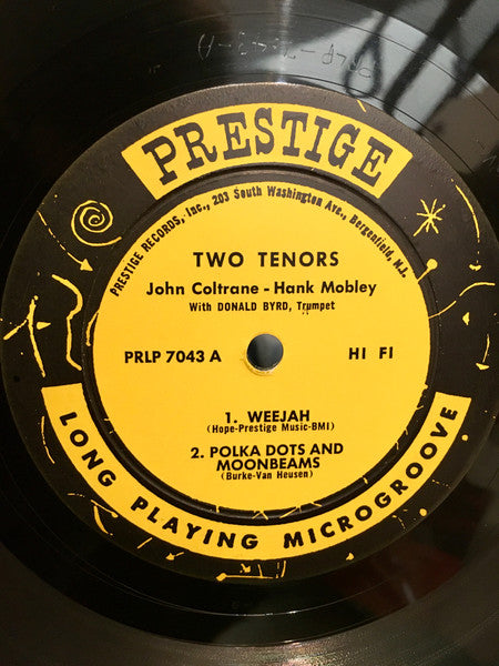 Image of Label Cover of LP - G/G+ - JOHN COLTRANE & HANK MOBLEY, Two Tenors (Prestige; PRLP 7043, US 1962), , Record has many light marks. Label is Prestige Fireworks with "Hi Fi" but sleeve does not have Prestige NJ address or "Printed in USA" on rear and is similar to the sleeve of the Blue Trident label reissue. Edgewear. Top seam half split, bottom seam fully split.  - 4426081E