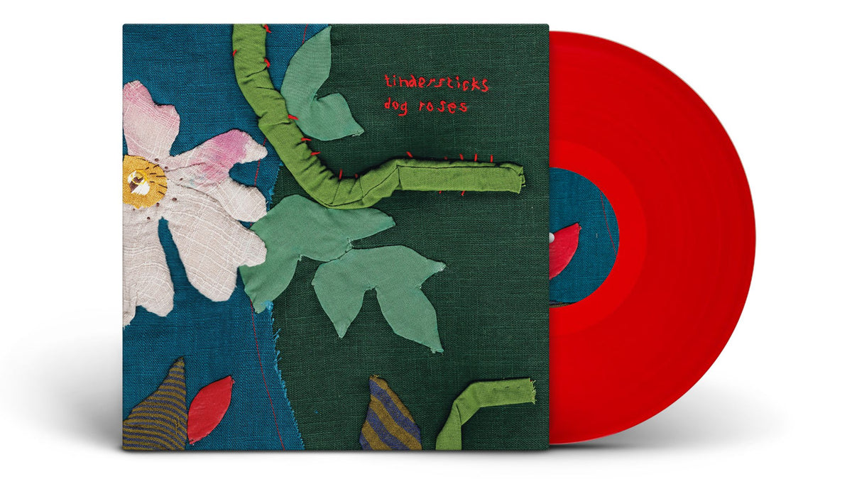 Image of Front Cover of LP - NEW - TINDERSTICKS, Dog Roses (City Slang; SLANG50630X, UK 2027, Indie Exclusive Red Bio Vinyl), , Tindersticks' new album continues a run of critically loved records, blending chamber pop, lounge jazz and soul into something cinematic and deeply atmospheric. This is late-night, lights-down listening from a band still operating at the height of its powers. - 9420804C