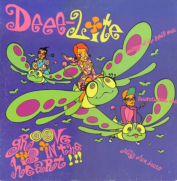 Image of Front Cover of 12" - VG+/VG+ - DEEE-LITE, Groove is in the Heart (Elektra; 0-66622, US 1990, Picture Sleeve), opened shrink,   - 3646426S