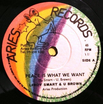 Image of Label Cover of 12" - VG/G+ - LEROY SMART & U BROWN, Peace Is What We Want (Aries Records; ARI 002, UK 1980s, Picture Sleeve), Lots of light marks, plays fine. SWOL. Lots of darkening and staining on sleeve, but it is intact and looks acceptable.,  - 2015533C